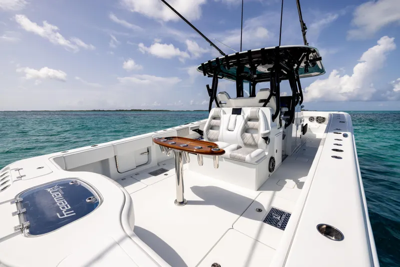  Yacht Photos Pics 2022 Freeman 37 VH boat on clear ocean water under a blue sky.