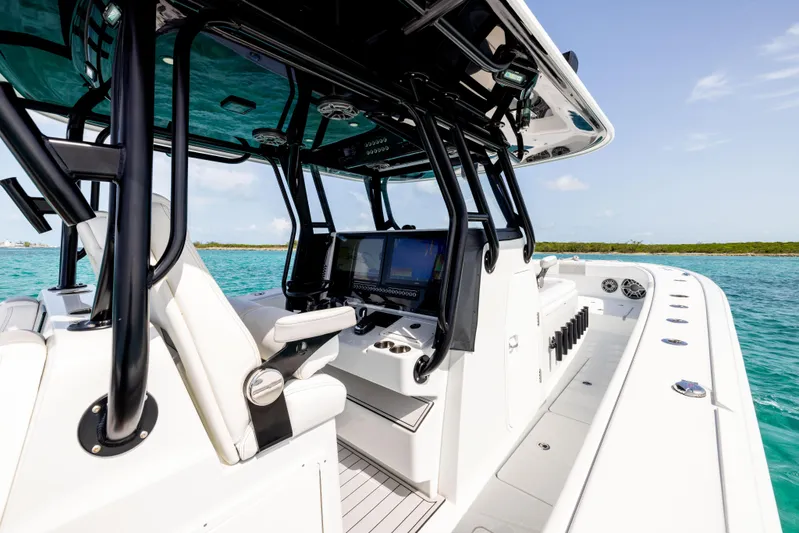  Yacht Photos Pics 2022 Freeman 37 VH boat interior with advanced navigation system on turquoise water.