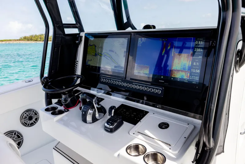  Yacht Photos Pics Freeman 37 VH 2022 boat dashboard with navigation screens and controls.