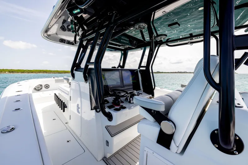  Yacht Photos Pics 2022 Freeman 37 VH boat interior with modern helm and ocean view.