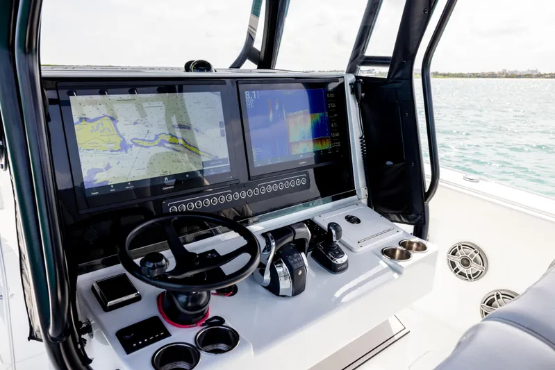  Yacht Photos Pics Cockpit of 2022 Freeman 37 VH boat with advanced navigation displays and controls.