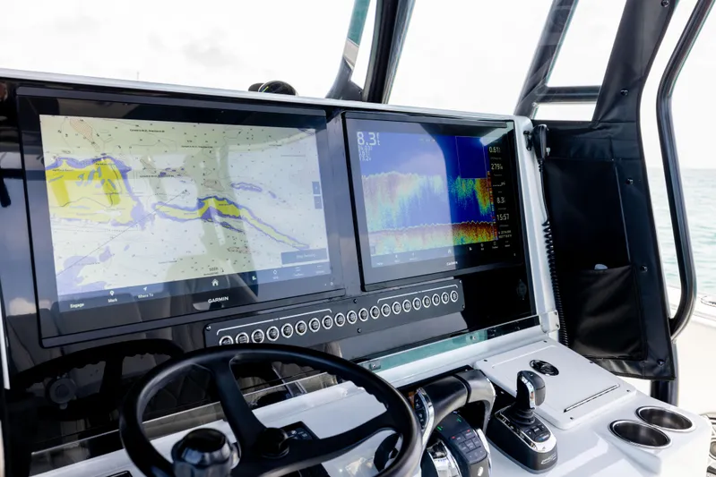  Yacht Photos Pics Freeman 37 VH 2022 boat dashboard with dual Garmin navigation screens and controls.