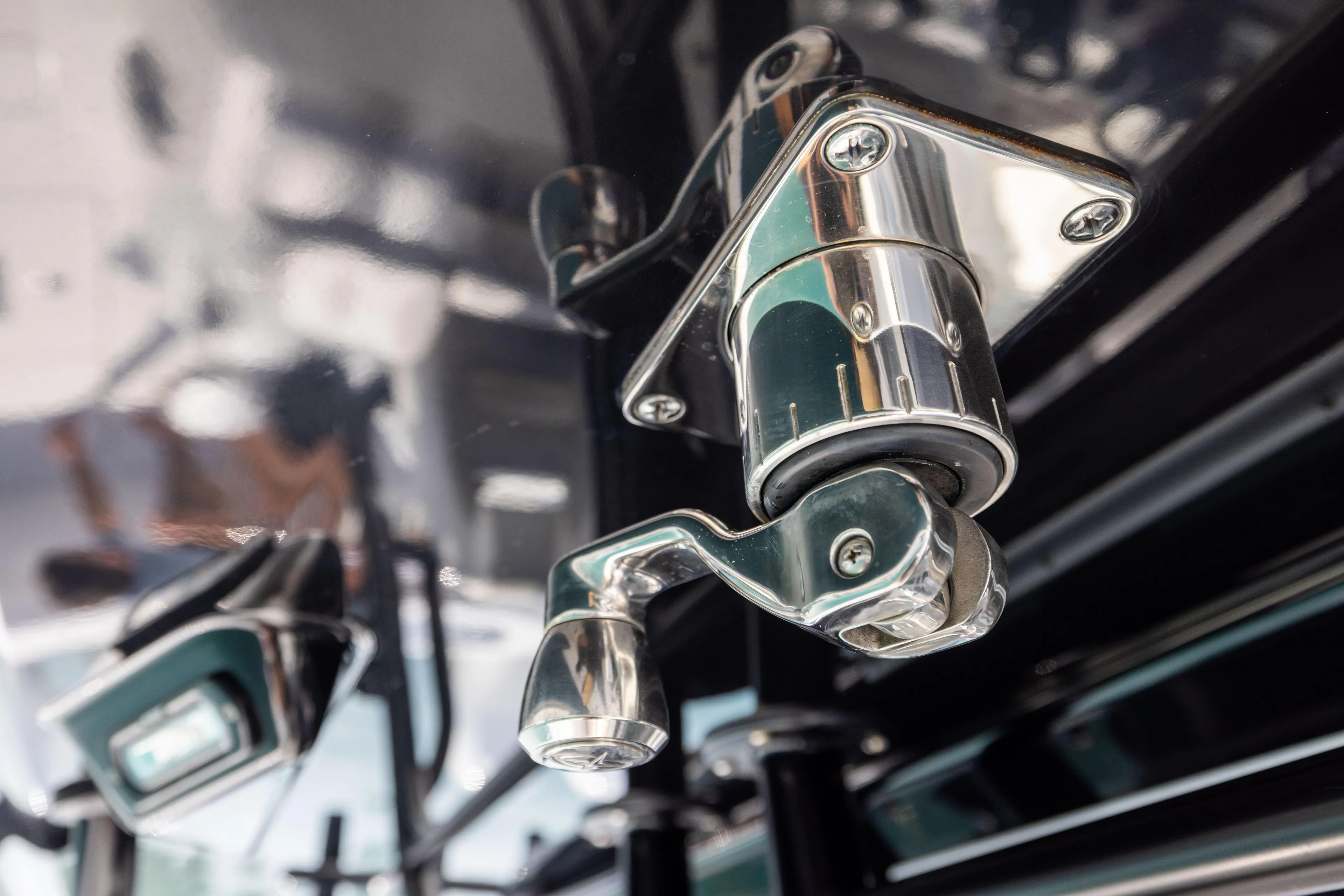  Yacht Photos Pics Close-up of a chrome latch mechanism on a 2022 Freeman 37 VH boat.