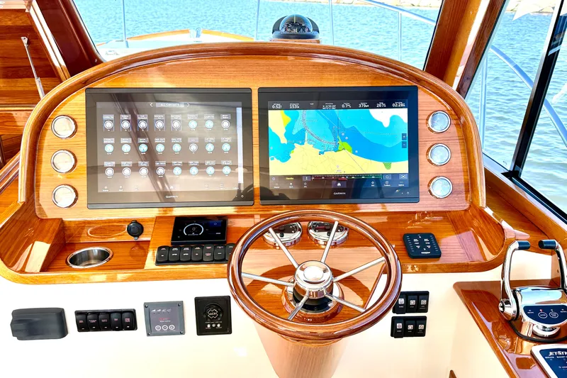Sterling Yacht Photos Pics 2024 Hinckley Picnic Boat 40 S helm with dual screens and wooden steering wheel.