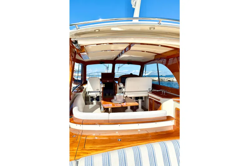 Sterling Yacht Photos Pics 2024 Hinckley Picnic Boat 40 S interior with elegant seating and wooden finishes.