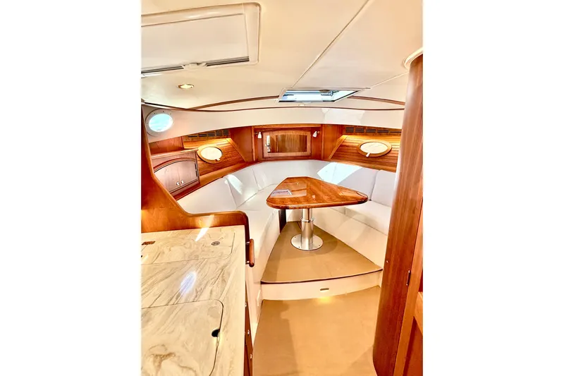 Sterling Yacht Photos Pics Luxurious interior of 2024 Hinckley Picnic Boat 40 S with elegant wood finishes.