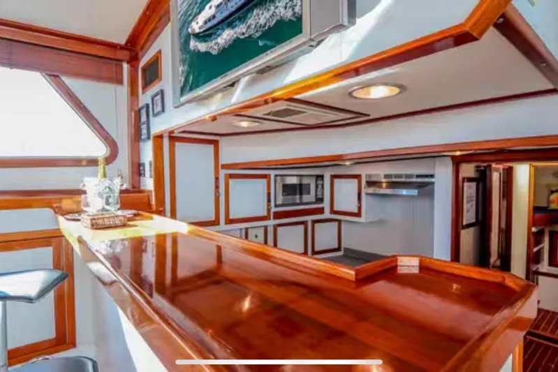  Yacht Photos Pics Interior of 1969 Islander 72 Aft Cabin Motor Yacht with polished wood and modern amenities.