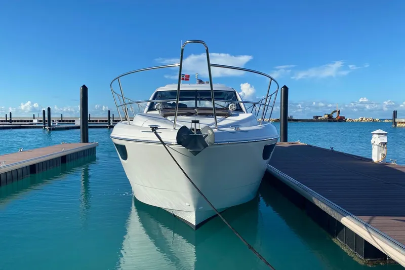 “amor Fati” Yacht Photos Pics 2014 Beneteau Gran Turismo 44 yacht docked in a serene marina setting.