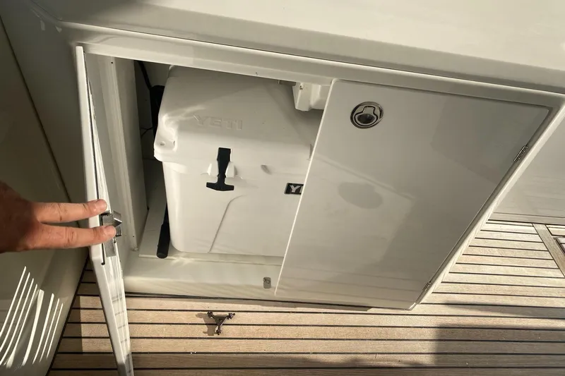 “amor Fati” Yacht Photos Pics Storage compartment on 2014 Beneteau Gran Turismo 44 with Yeti cooler inside.