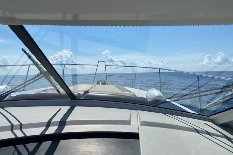 “amor Fati” Yacht Photos Pics 2014 Beneteau Gran Turismo 44 yacht cruising on open sea under clear blue sky.