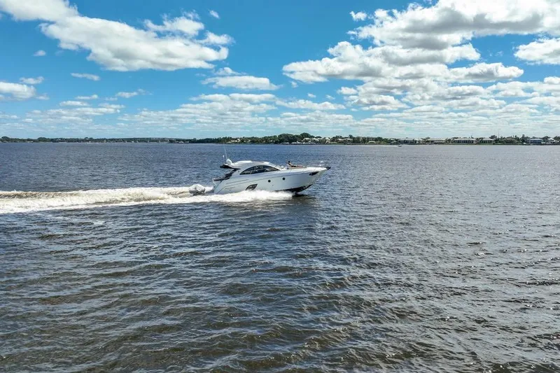 “amor Fati” Yacht Photos Pics 2014 Beneteau Gran Turismo 44 yacht cruising on a sunny day with blue skies.