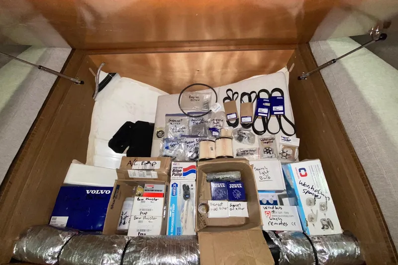 “amor Fati” Yacht Photos Pics Storage compartment with various spare parts for a 2014 Beneteau Gran Turismo 44 yacht.