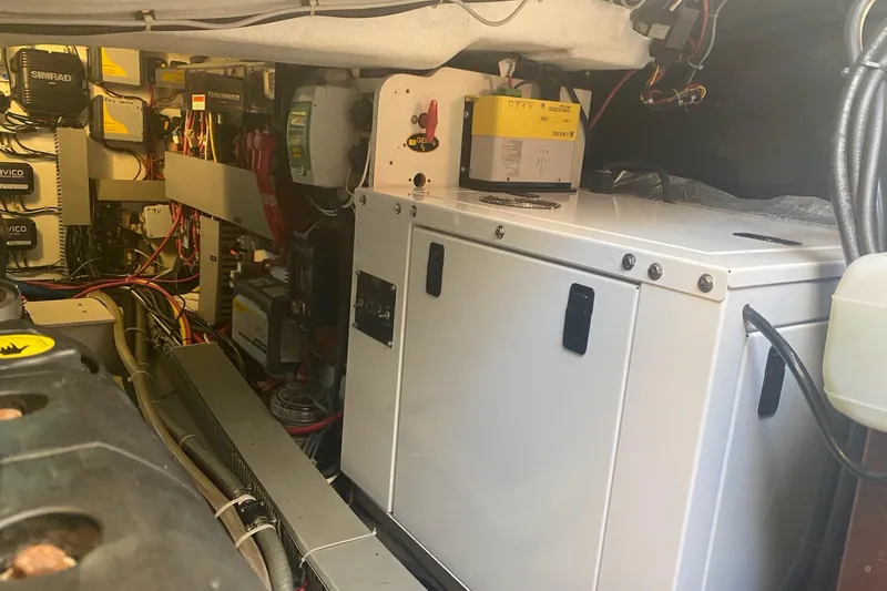 “amor Fati” Yacht Photos Pics Engine room of 2014 Beneteau Gran Turismo 44 with electrical components and wiring.