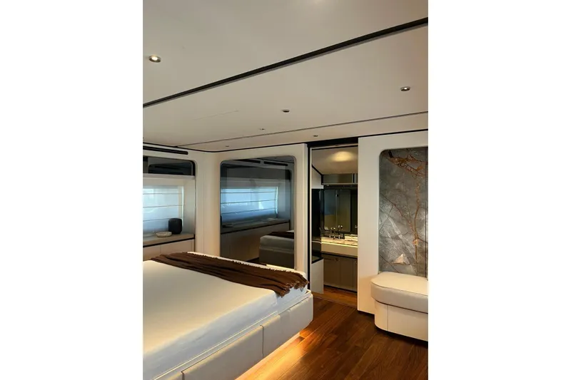  Yacht Photos Pics Luxurious interior of 2026 Ferretti Yachts 940, featuring elegant bedroom and modern design.