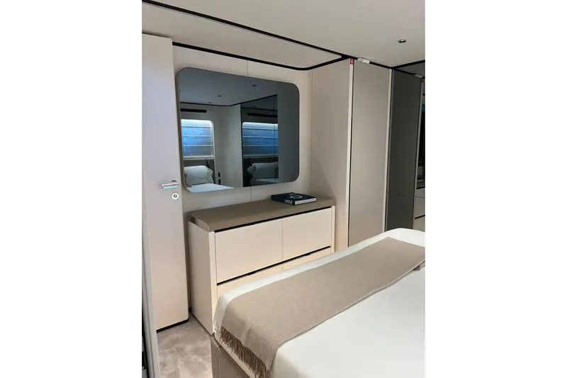  Yacht Photos Pics Luxurious interior of 2026 Ferretti Yachts 940, featuring elegant bedroom design.
