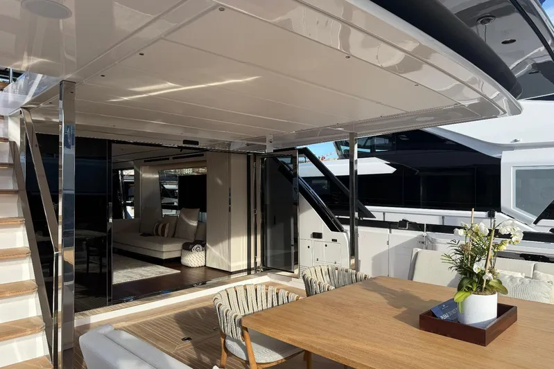  Yacht Photos Pics 2026 Ferretti Yachts 940 luxury yacht interior with elegant seating and dining area.