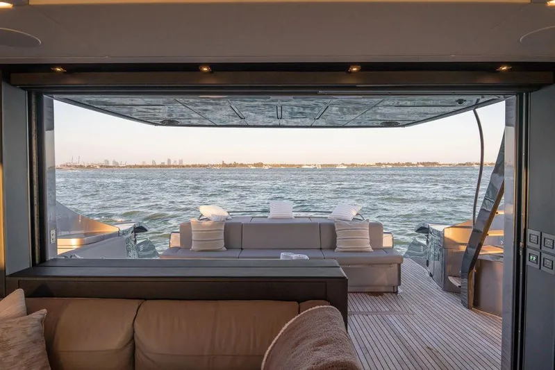  Yacht Photos Pics Luxurious interior view of 2022 Pershing 8X yacht overlooking the ocean.