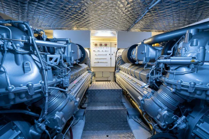  Yacht Photos Pics Engine room of 2022 Pershing 8X yacht, showcasing advanced machinery and control panels.