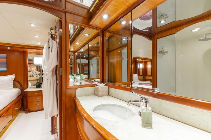 Aurelia Yacht Photos Pics Luxurious 2007 President Tri-Deck yacht interior with elegant wood finishes and modern amenities.