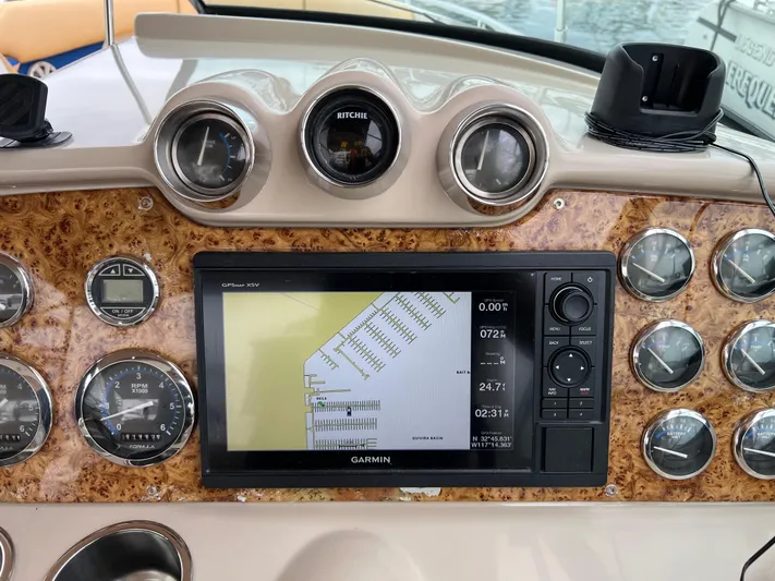  Yacht Photos Pics Dashboard of a 2009 Formula 310 BR boat with Garmin navigation system.