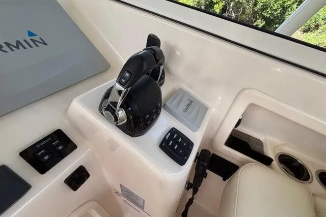  Yacht Photos Pics Control panel of 2019 Grady-White Freedom 285 boat with Garmin electronics.