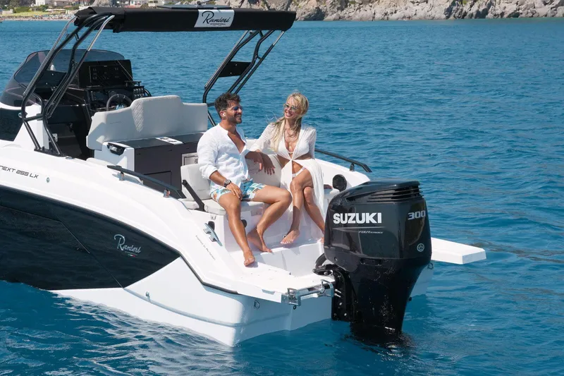  Yacht Photos Pics Couple enjoying a sunny day on a 2025 Ranieri NEXT 255 LX boat.