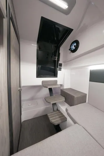  Yacht Photos Pics Interior of 2025 Ranieri NEXT 255 LX boat, featuring modern design and compact layout.