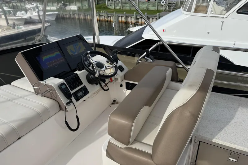 Blue Skies Yacht Photos Pics Helm of 2017 Regal 42 Fly yacht with modern navigation equipment.