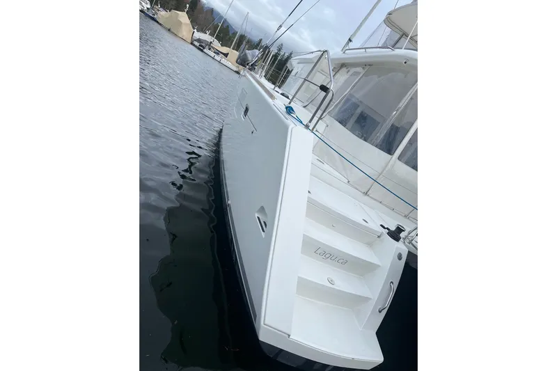 "lagu" Yacht Photos Pics 2011 Lagoon 450 catamaran docked at marina, side view.