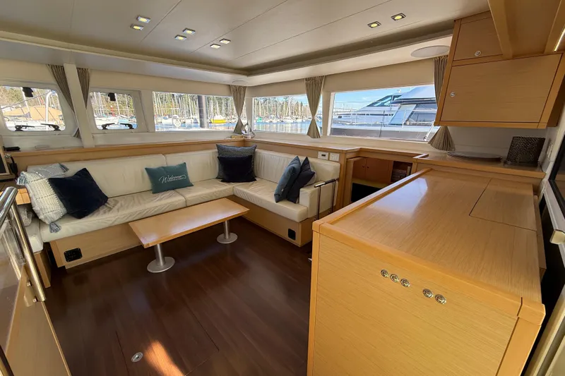 "lagu" Yacht Photos Pics Luxurious interior of 2012 Lagoon 450 catamaran with elegant seating and modern design.