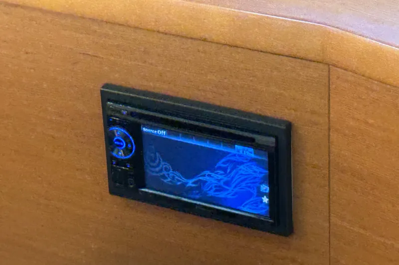  Yacht Photos Pics Control panel on 2013 Prestige 500 yacht with blue display and wood finish.