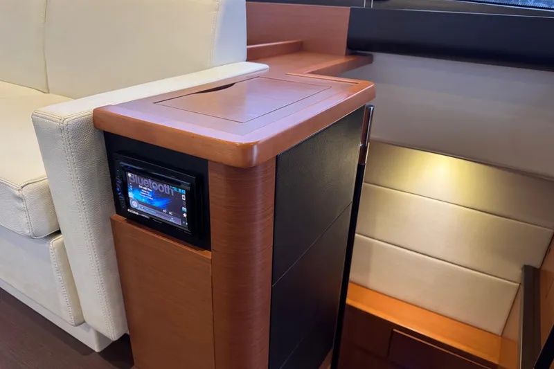  Yacht Photos Pics Interior of 2013 Prestige 500 yacht with Bluetooth audio system and elegant wood finish.