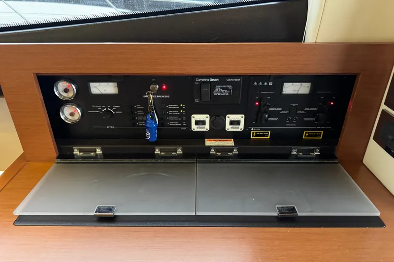  Yacht Photos Pics Control panel of a 2013 Prestige 500 yacht with gauges and switches.