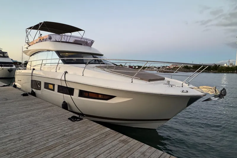  Yacht Photos Pics 2013 Prestige 500 yacht docked at marina, showcasing sleek design and luxury features.