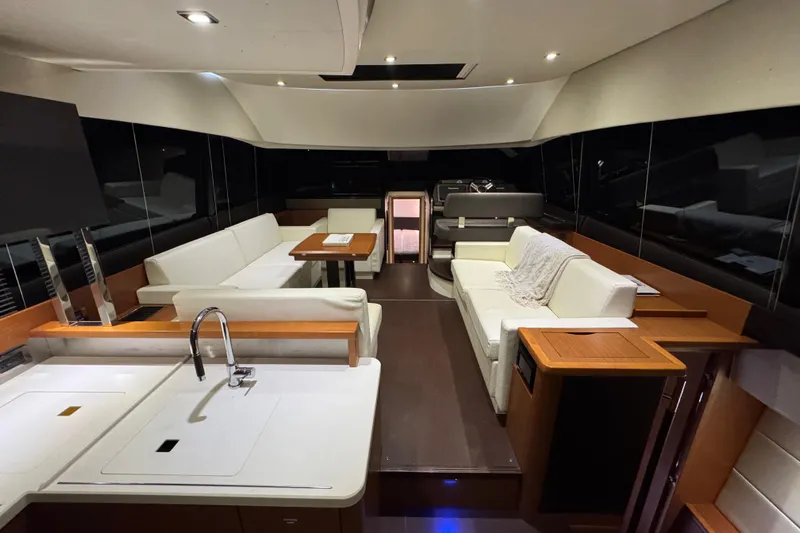  Yacht Photos Pics Luxurious interior of a 2013 Prestige 500 yacht with modern seating and sleek design.