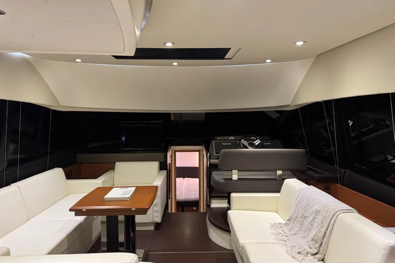  Yacht Photos Pics Luxurious interior of a 2013 Prestige 500 yacht with elegant seating and modern design.