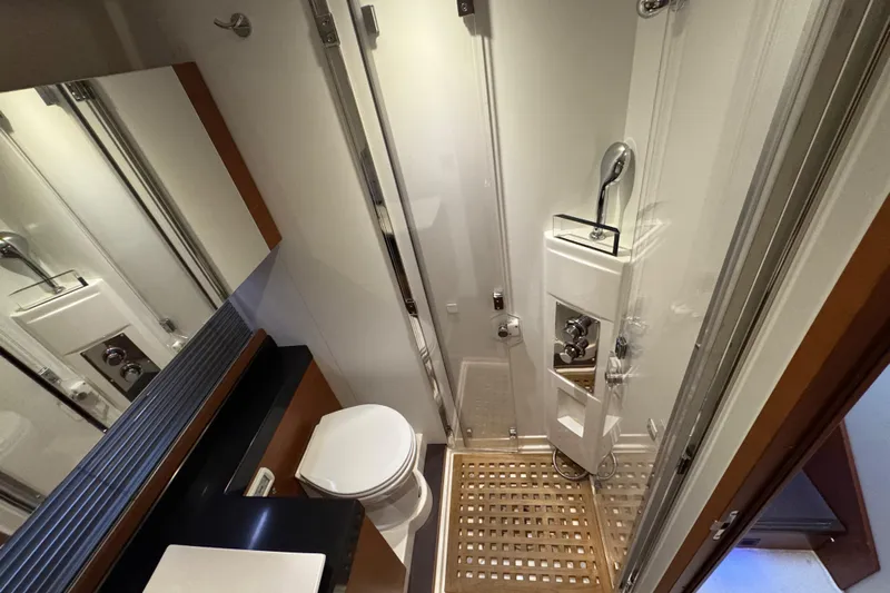  Yacht Photos Pics Luxurious bathroom in a 2013 Prestige 500 yacht, featuring modern fixtures and sleek design.
