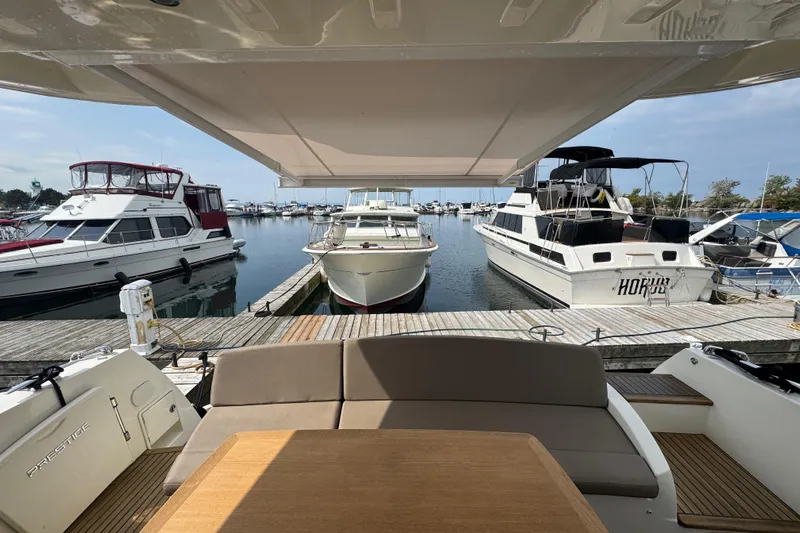  Yacht Photos Pics Prestige 500 yacht, 2013 model, docked at marina with other boats.