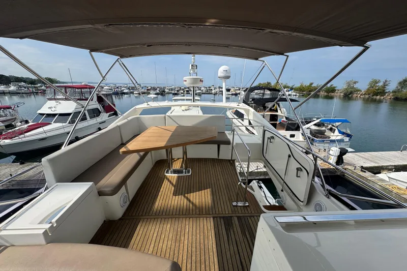  Yacht Photos Pics Luxurious 2013 Prestige 500 yacht with spacious deck and marina view.