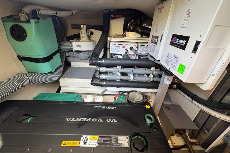  Yacht Photos Pics Engine room of a 2013 Prestige 500 yacht with mechanical systems and equipment.