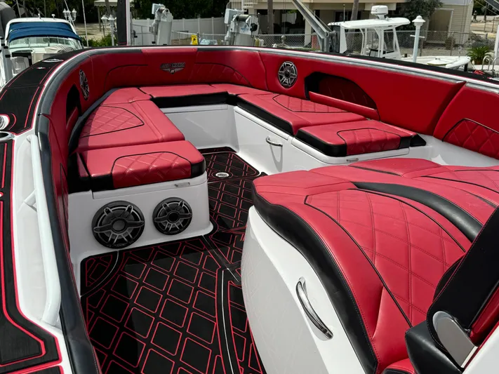  Yacht Photos Pics Luxurious red and black interior of 2022 Deep Impact 399 boat.