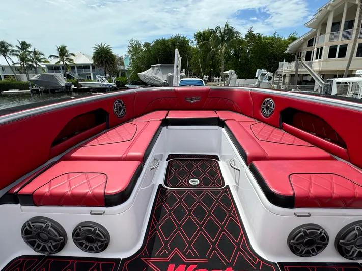  Yacht Photos Pics Luxurious 2022 Deep Impact 399 boat with red seating and stylish design.