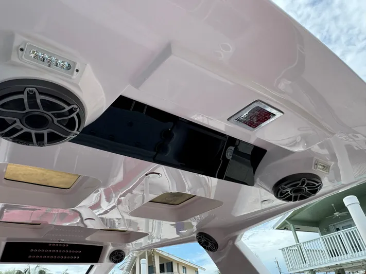  Yacht Photos Pics Interior view of 2022 Deep Impact 399 boat ceiling with speakers and lights.