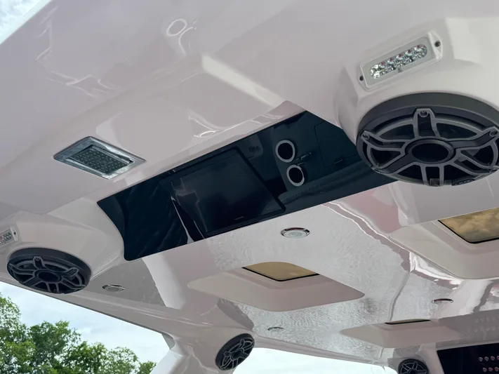  Yacht Photos Pics Ceiling view of 2022 Deep Impact 399 boat with speakers and lights.