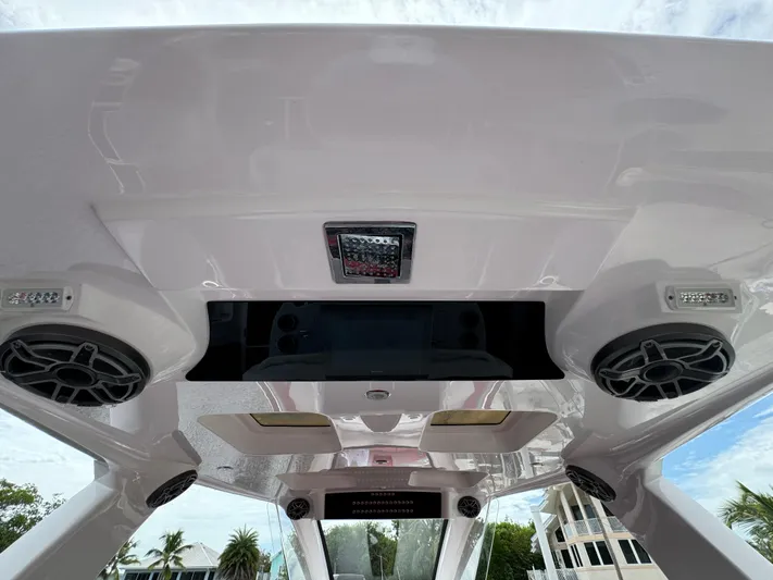  Yacht Photos Pics Deep Impact 399 boat interior ceiling with speakers, 2022 model.