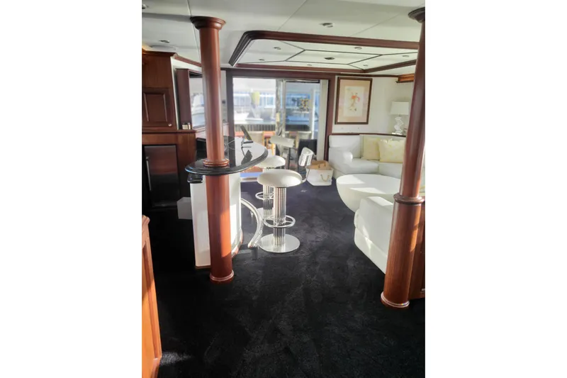Lemonade Yacht Photos Pics Luxurious interior of 2007 Cheoy Lee 100 yacht with elegant seating and modern decor.