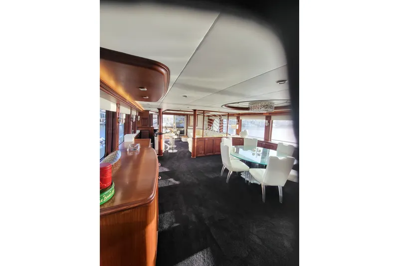 Lemonade Yacht Photos Pics Luxurious interior of 2007 Cheoy Lee 100 yacht with elegant dining area.