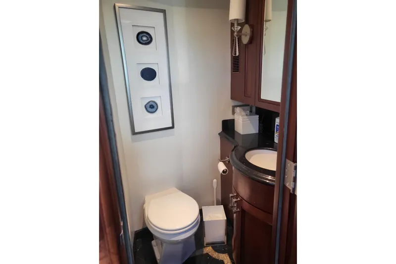 Lemonade Yacht Photos Pics Luxurious bathroom in 2007 Cheoy Lee 100 yacht with elegant wood cabinetry.