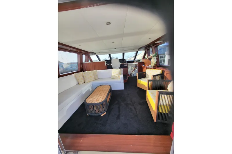 Lemonade Yacht Photos Pics Luxurious interior of a 2007 Cheoy Lee 100 yacht with elegant seating and decor.