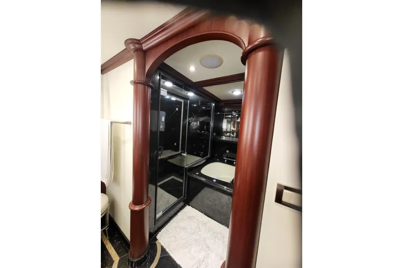 Lemonade Yacht Photos Pics Luxurious bathroom with wooden archway in 2007 Cheoy Lee 100 yacht.